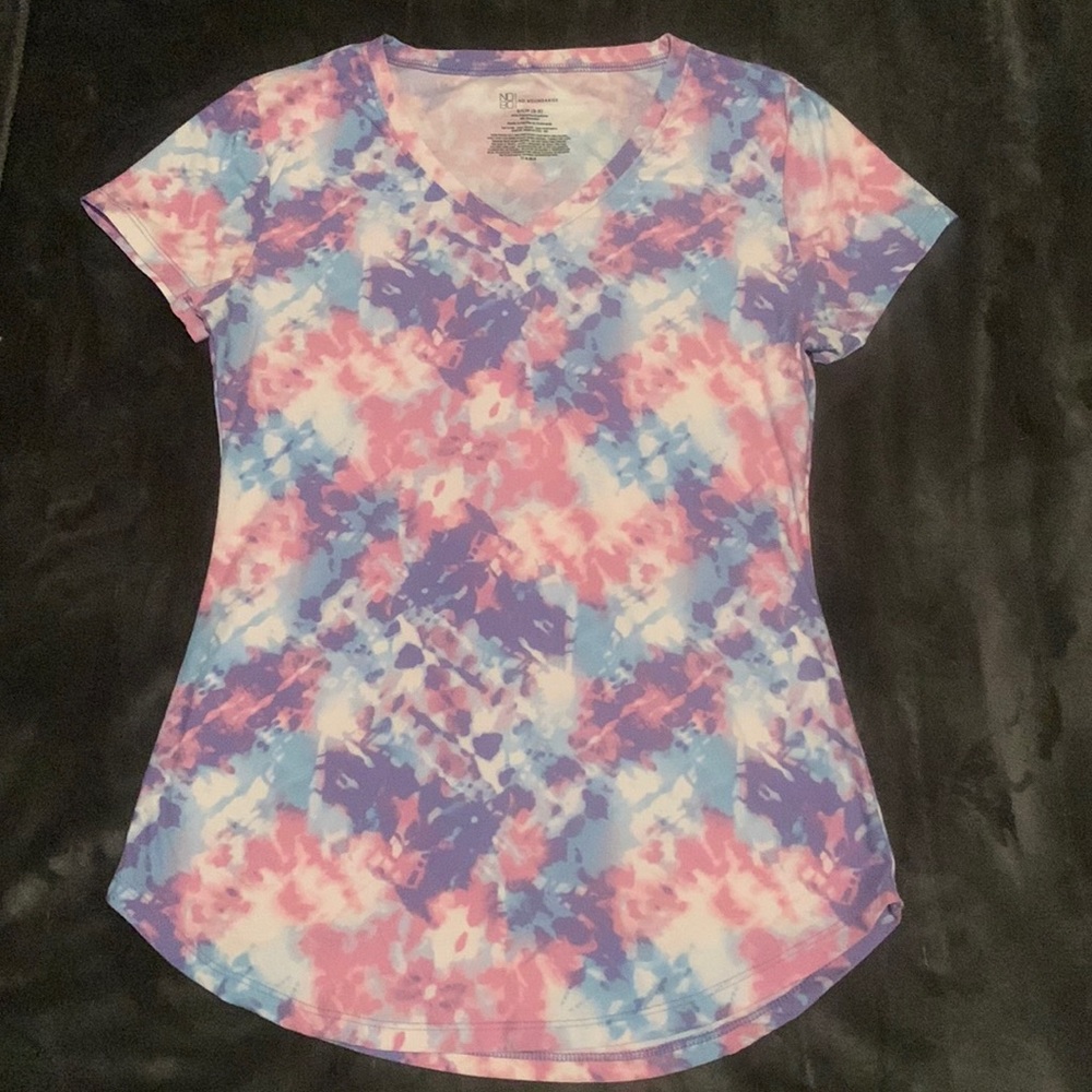 This is a juniors, fitted t-shirt. No boundaries, polyester and spandex blend.